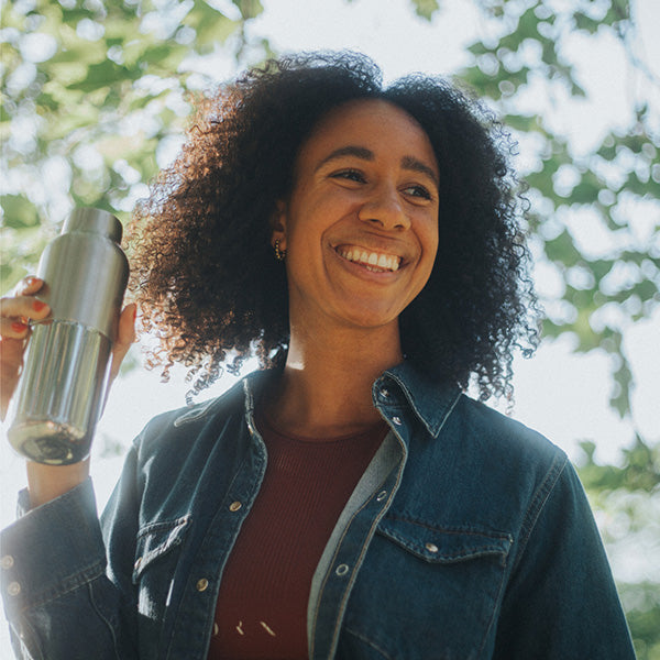bring-your-own-party-kit-tumblers-and-cocktails-c5 16oz_rise_reflect_woman_smile_square.jpg