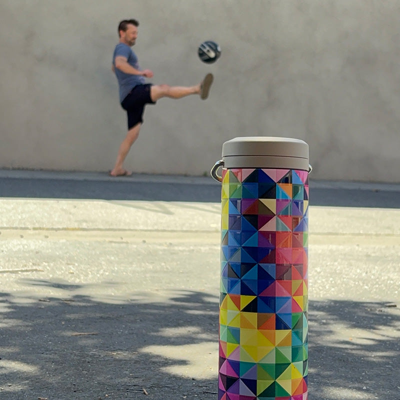 20oz-tkwide-with-twist-cap-mosaic-a0 20oz_tkwide_bottle_seasonal_mosaic_soccerball_player_square.jpg