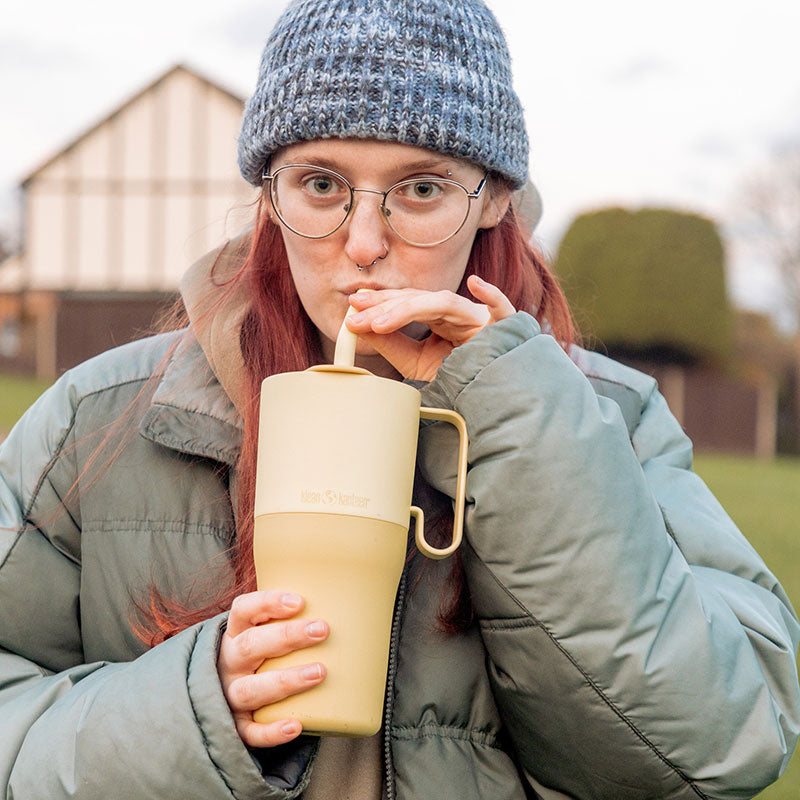 26oz-rise-tumbler-with-straw-lid-q1 26oz_rise_rumbler_straw_wax_yellow_woman_sip_square.jpg