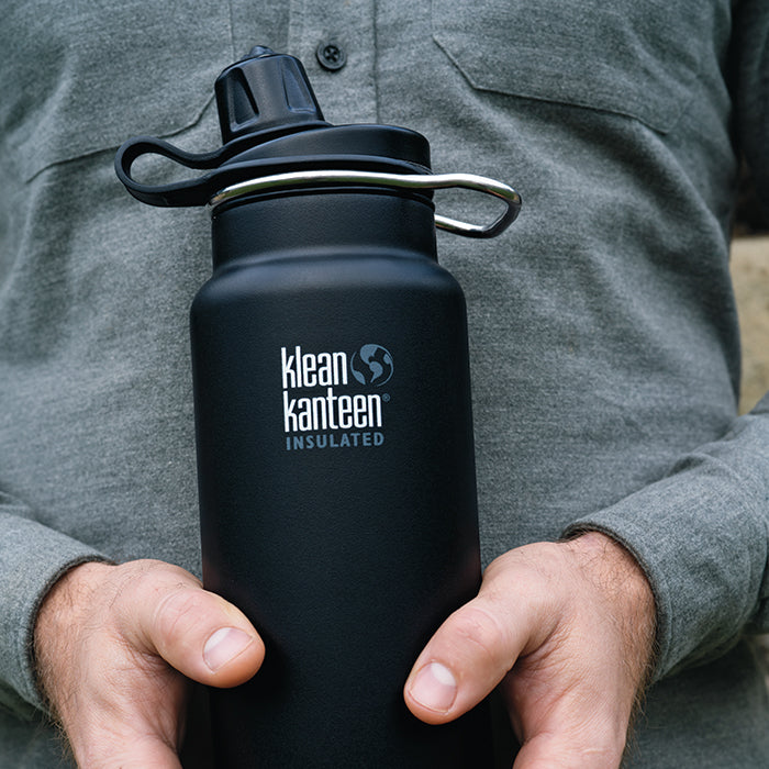 tkwide-chug-cap-n6 K32TKWSSL-SB-Craddled-Bottle_closeup_lifestyle.jpg