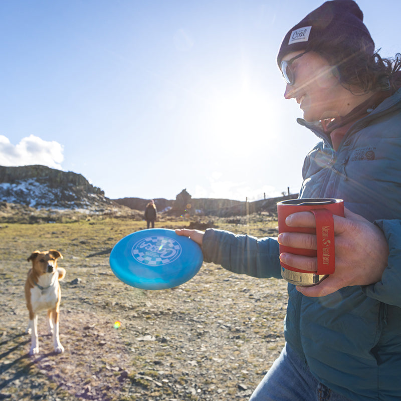 12oz-camp-mug-d5 insulated_camp_mug_12oz_woman_dog_frisbee_square.jpg