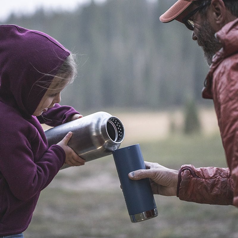 64oz-tkwide-with-loop-cap-w1 tkwide_64oz_bottle_girl_dad_filling_square.jpg